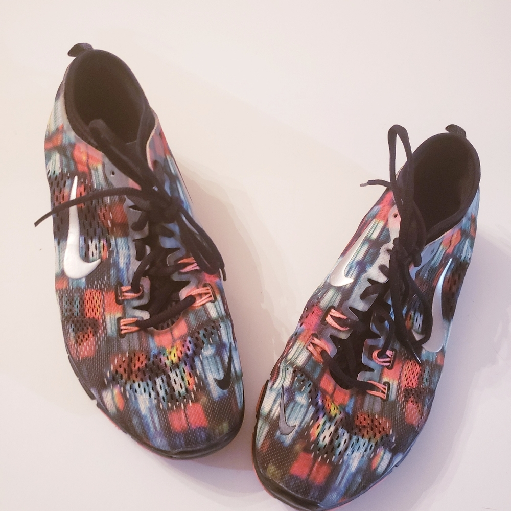 Original Nike's multi colored women free training shoes.